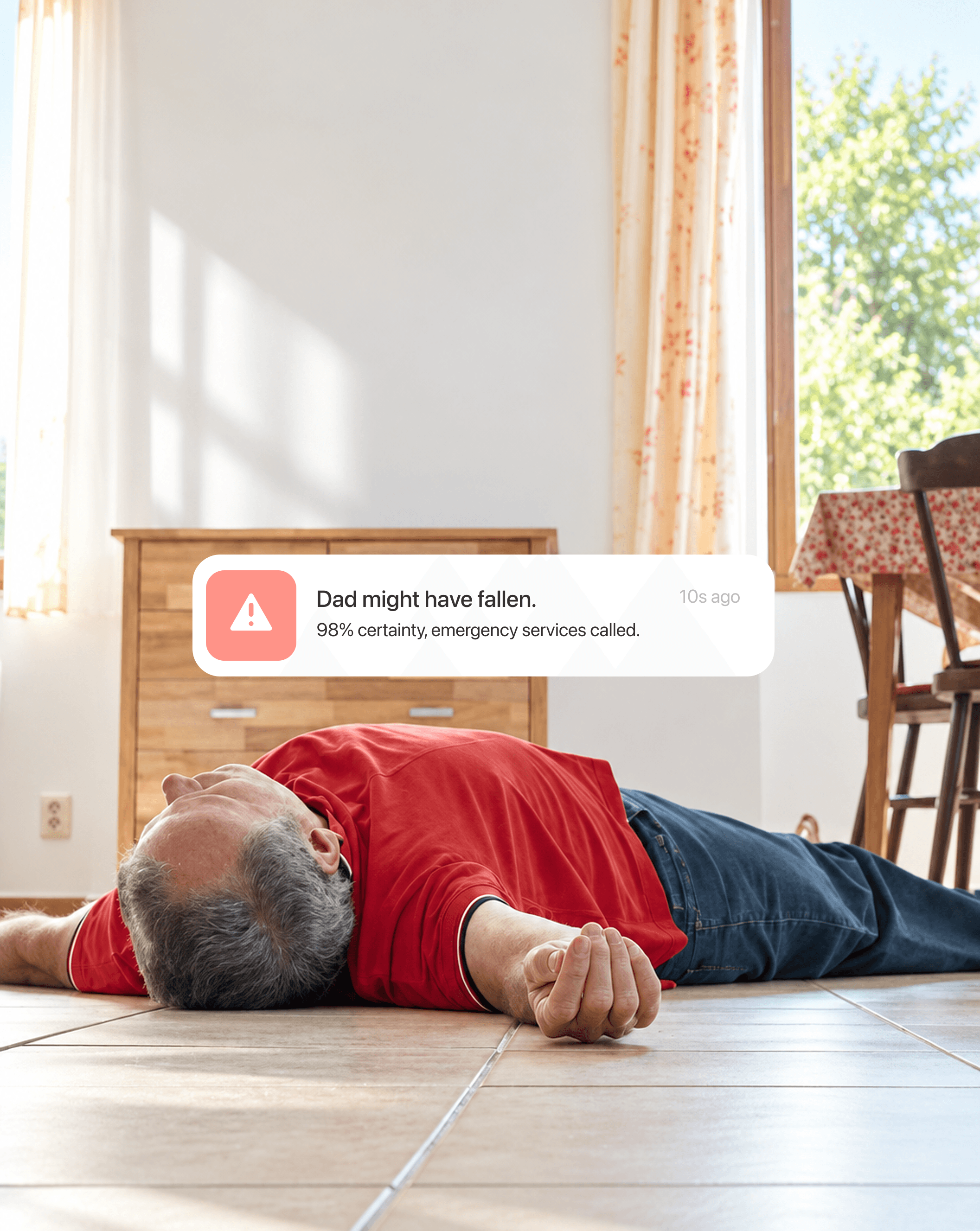 Illustration of a possible fall alert beside an older man on the floor